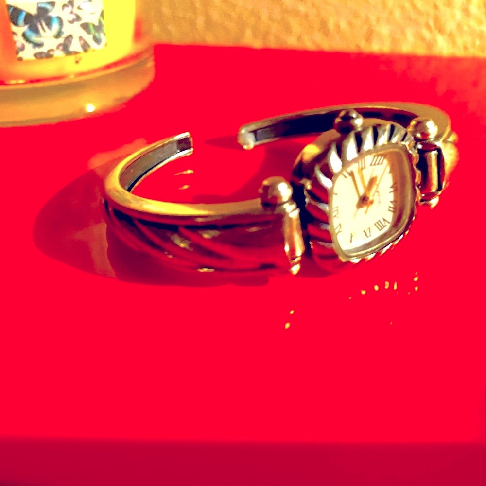 Silver hinged bracelet watch. Easy on. Easy off!